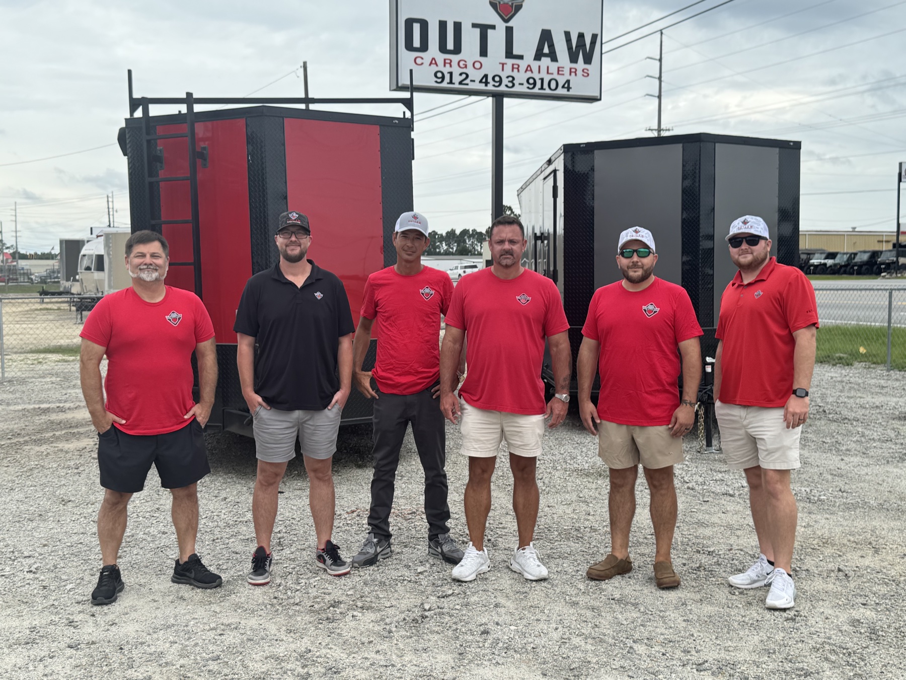 The Outlaw Supercenter crew in front of the lot in Douglas, Georgia